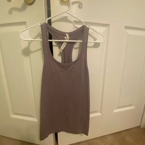 Lightly used LULULEMON swiftly tech racerback 2.0 light purple color.